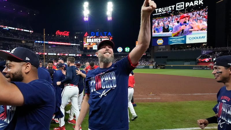 Atlanta Braves pitcher Chris Sale points ot the crowd after Game 3 of baseball's NL Wild Card...