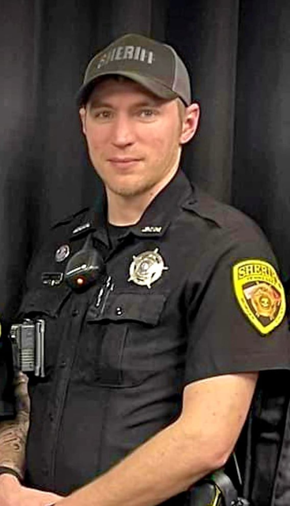 Tim Coryell Morgan County Deputy saves woman who crashed into pond