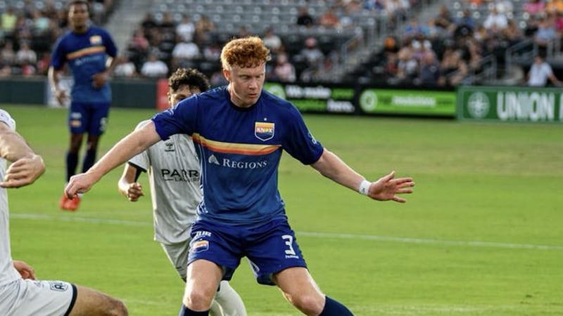 One Knox's Finn McRobb dribbles past a defender
