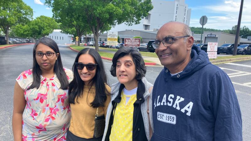 Mahendra Patel, far right, was released from jail on Tuesday, May 6, 2025.