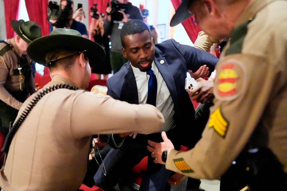 KeShaun Pearson is arrested and removed from the House gallery by state troopers during a...
