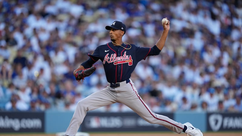 Atlanta Braves starting pitcher Ray Kerr works against a Los Angeles Dodgers batter during the...