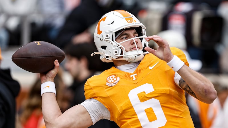 Tennessee quarterback Joey Aguilar (6) throws to a receiver during warmups before an NCAA...
